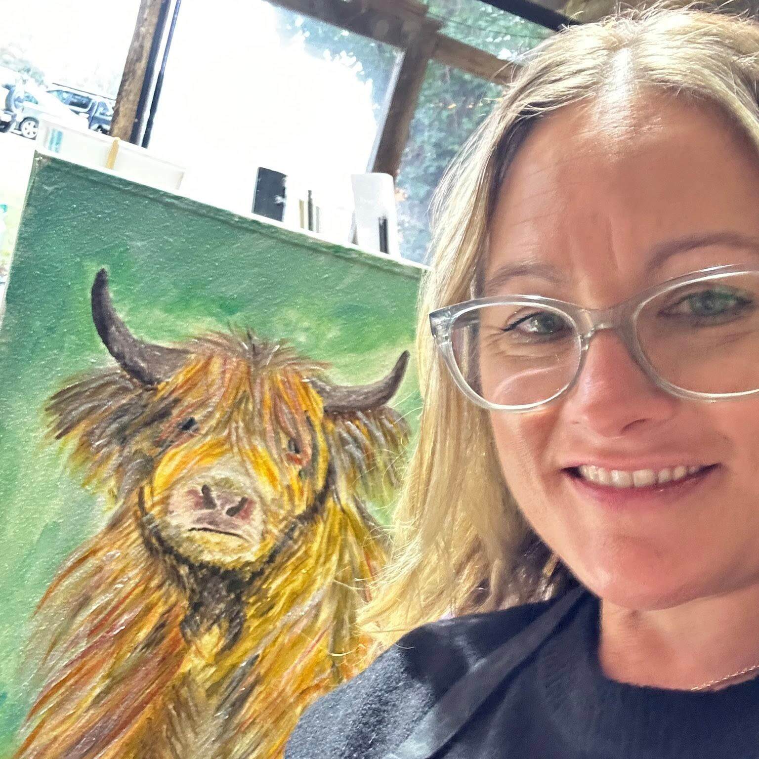 Highland Cow guest with artwork
