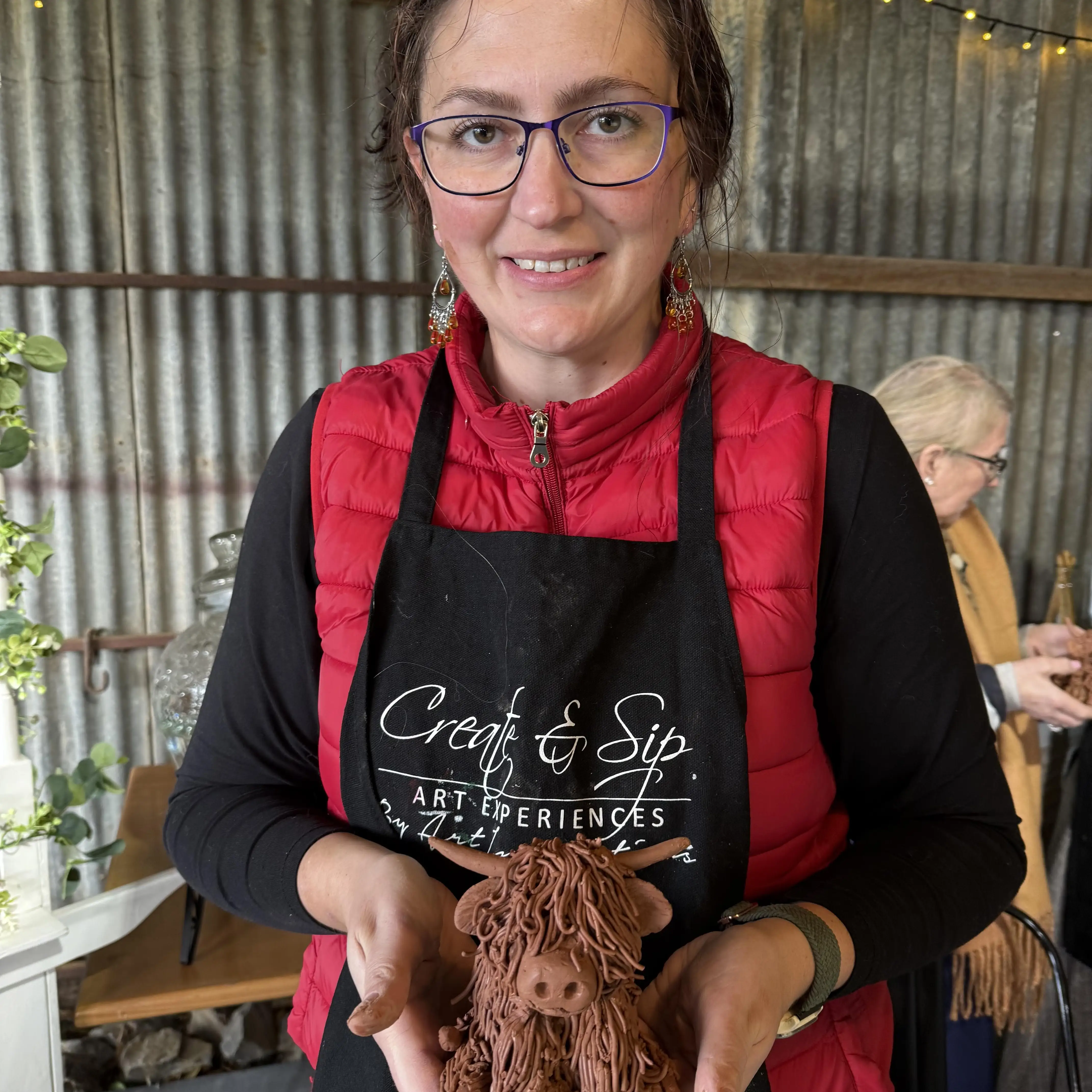 Highland Clay Cow with client